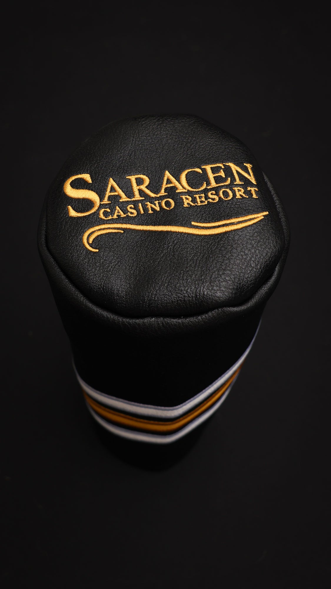 top view of the 2024 custom golf headcover with 3 stripes and embroidered logo make from black pu leather