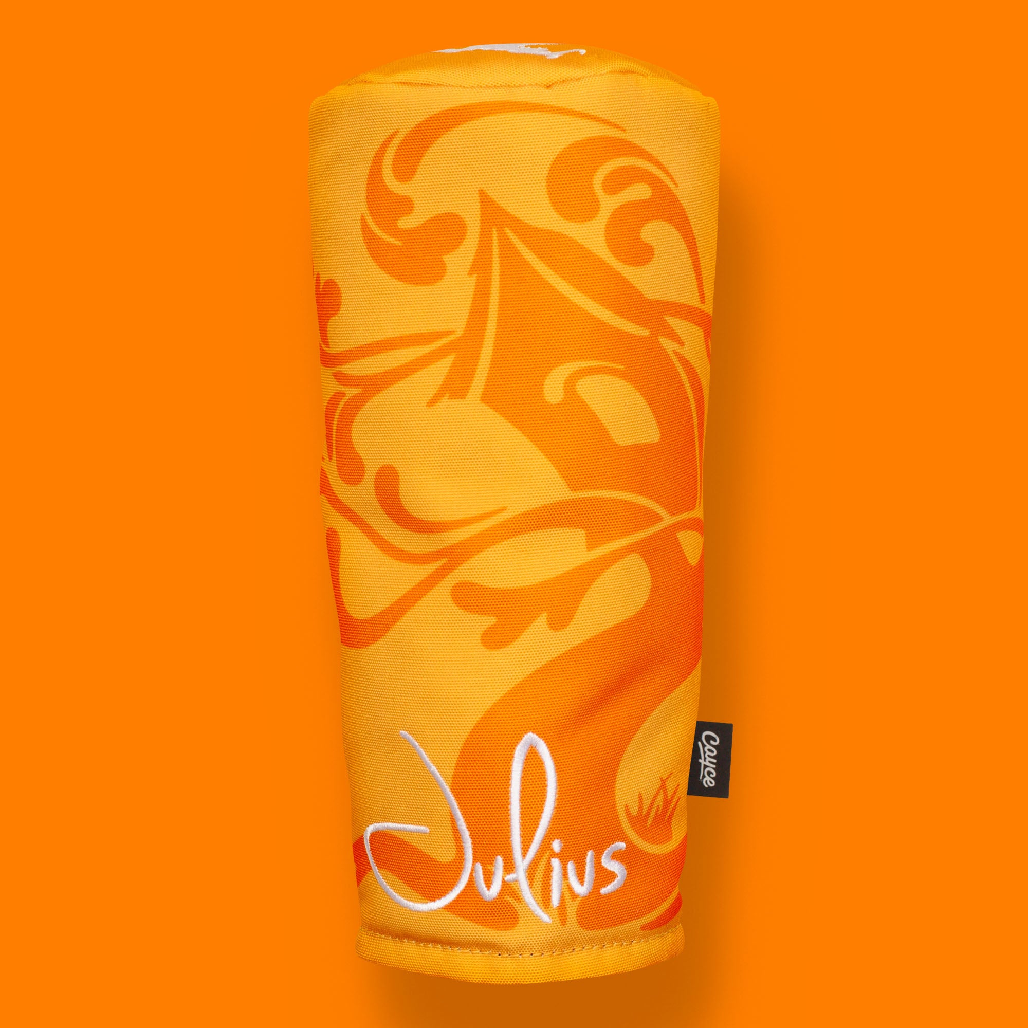 Custom golf headcovers for Tree House Brewing's "Julius" feature their bright yellow and orange label design and embroidered Julius and Tree House logos.