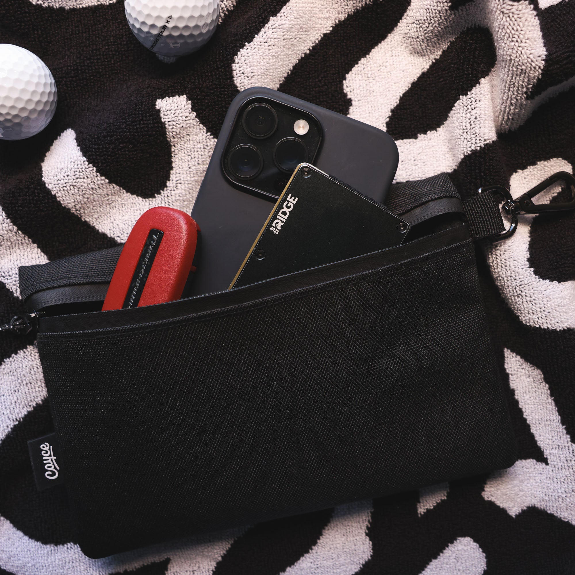 durable golf valuables pouch storing iphone, wallet, and keys
