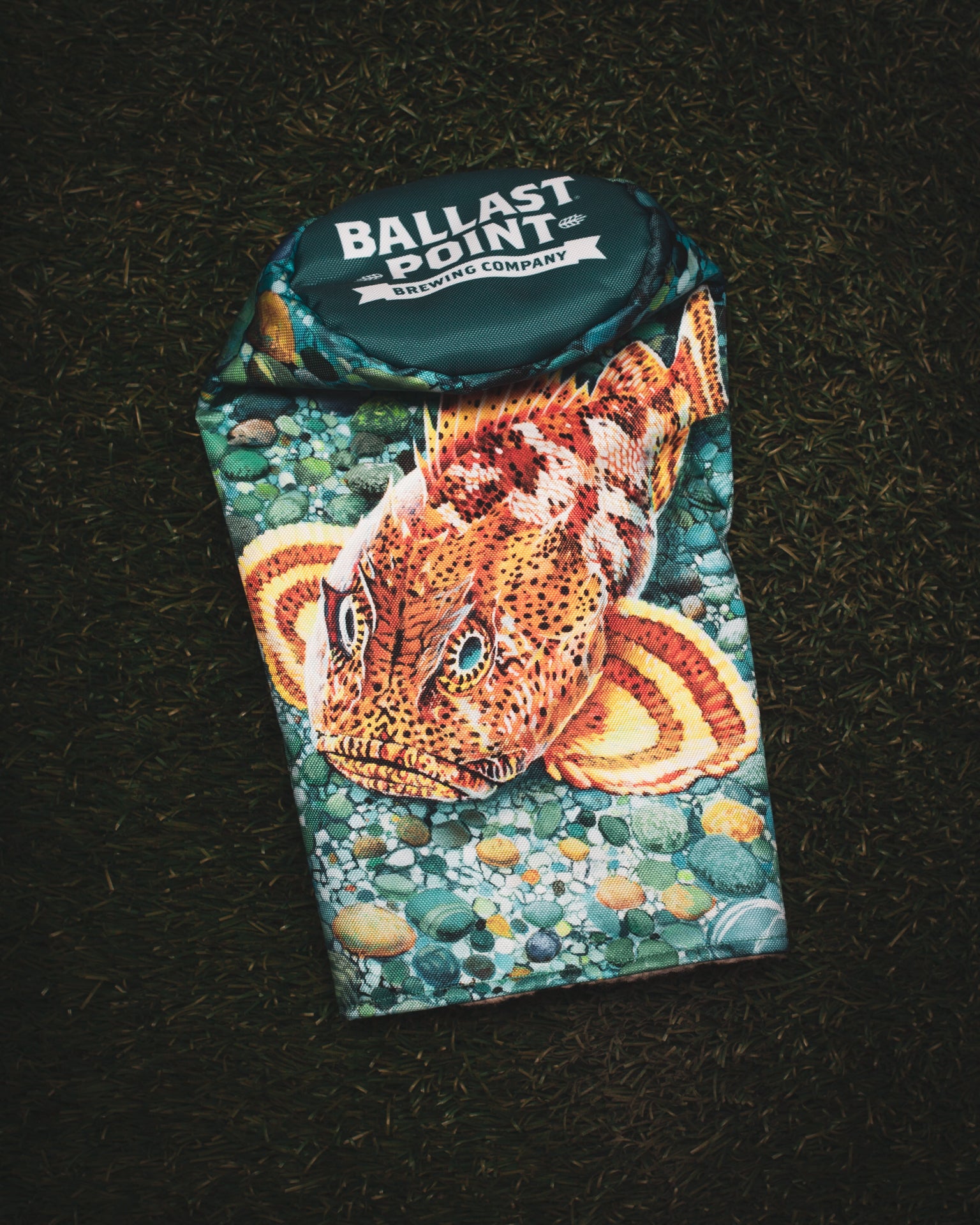 Custom golf headcover for Ballast Point Brewery featuring their Sculpin art with a teal top with their logo.